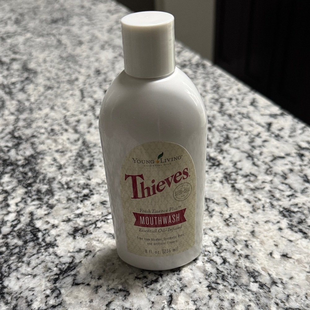 Young Living Thieves Mouthwash - White and Red